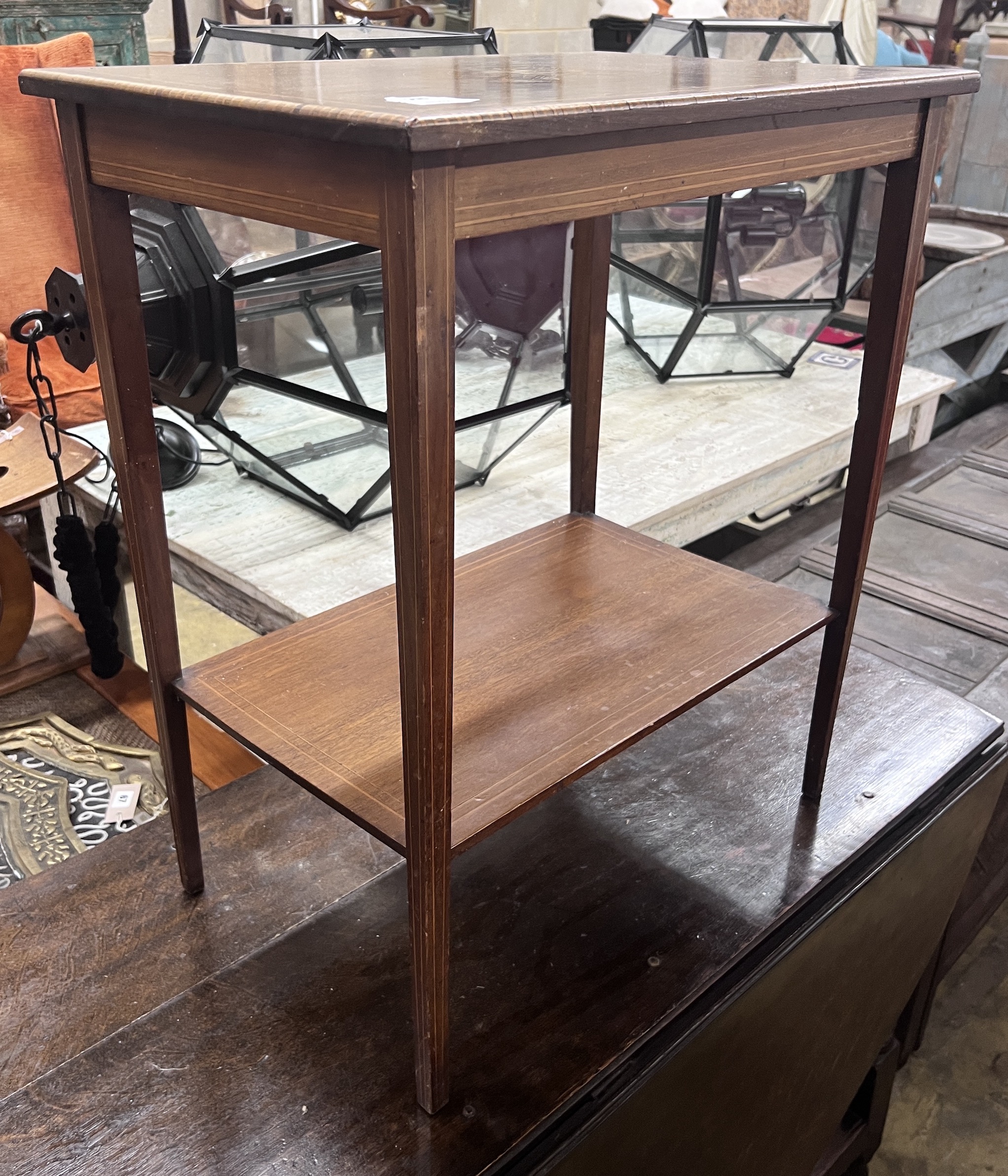 An Edwardian rectangular marquetry inlaid mahogany two tier occasional table, width 80cm, depth 40cm, height 71cm